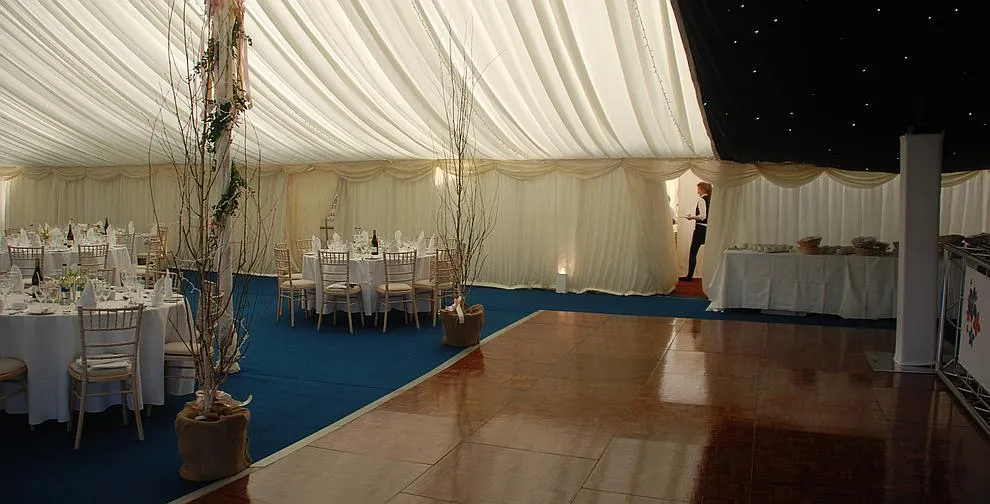 Marquee furniture arranged for a reception