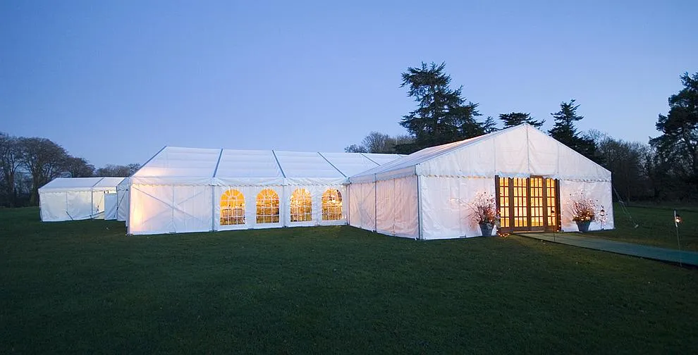 A framed marquee with clear window panels along one side